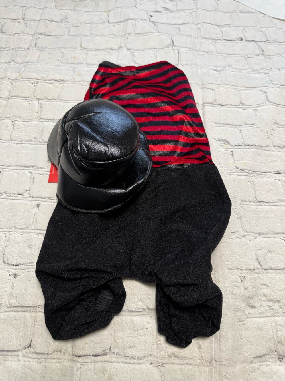 Pet Warrior Dog Striped Red & Black shirt and black pants custome. Halloween co
